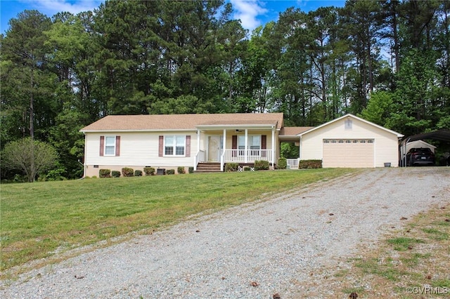 ranch-style house featuring covered porch, driveway, an outdoor structure, a front lawn, and an attached garage