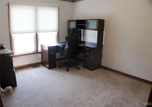 office area with baseboards, carpet, and visible vents