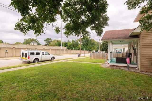 view of yard with fence