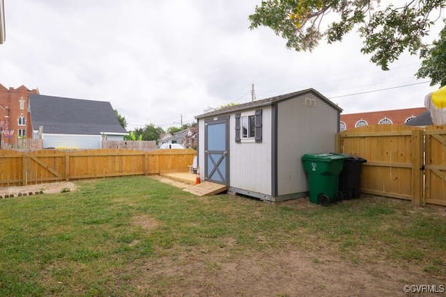 view of shed with a fenced backyard
