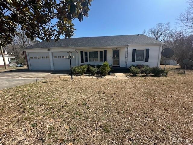 2789 Sussex Dr, Emporia, VA 23847 - ranch-style house featuring an attached garage and concrete driveway
