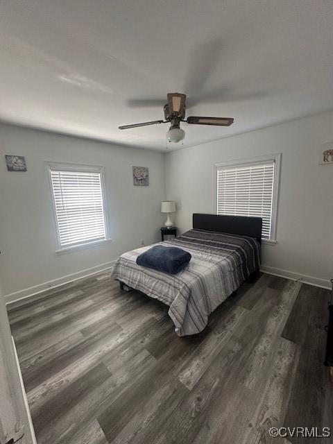 2789 Sussex Dr, Emporia, VA 23847 - bedroom with a ceiling fan, baseboards, and wood finished floors