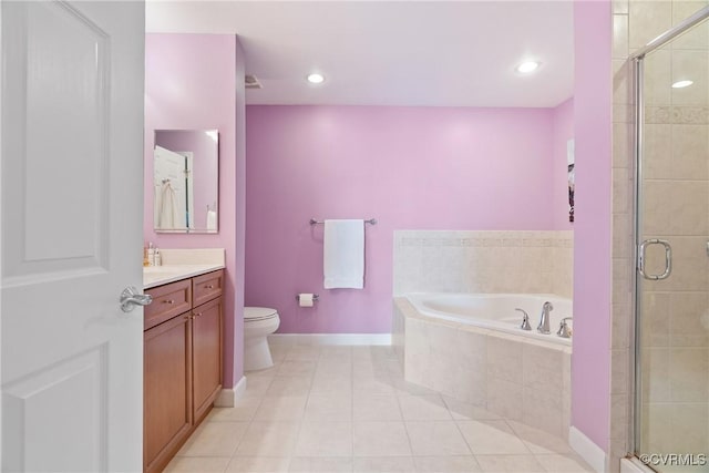 bathroom with vanity, tile patterned floors, baseboards, a garden tub, and a stall shower