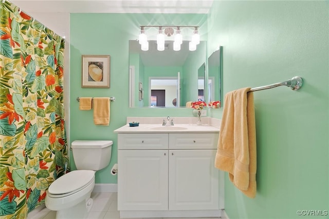 bathroom featuring a shower with curtain, tile patterned floors, baseboards, vanity, and toilet