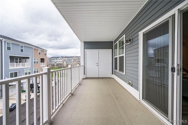 balcony featuring a residential view