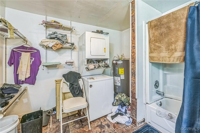 4591 Allen Rd, Jarratt, VA 23867 - laundry area with stacked washer / drying machine, laundry area, and electric water heater