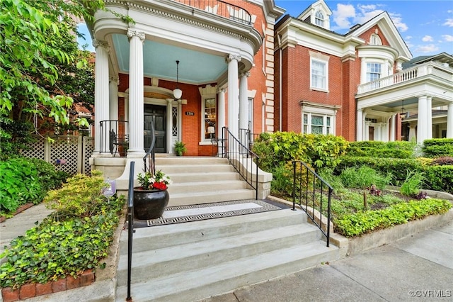 2218 Monument Ave, Richmond, VA 23220 - property entrance featuring brick siding and a porch