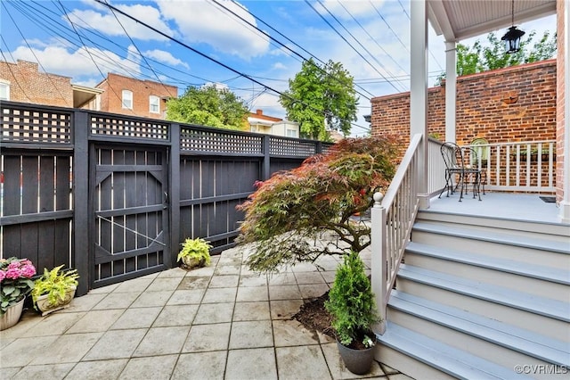 2218 Monument Ave, Richmond, VA 23220 - view of patio featuring fence and a gate
