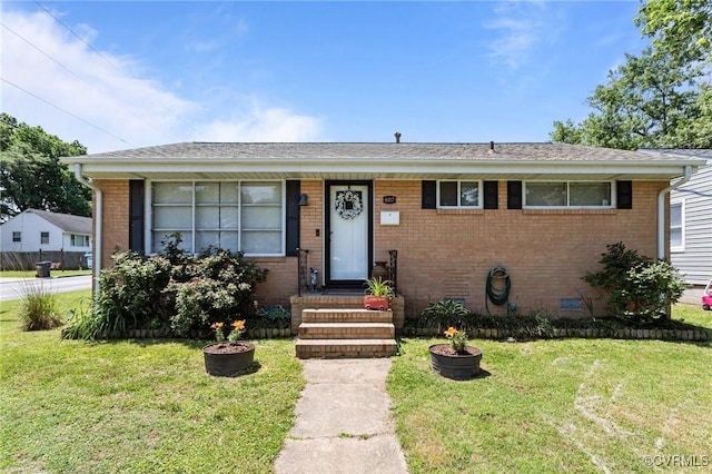607 Pinehurst Ave, Colonial Heights, VA 23834 - view of front of home featuring brick siding, a front yard, and roof with shingles