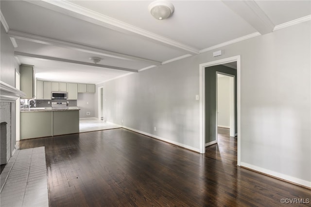 unfurnished living room featuring baseboards, ornamental molding, a brick fireplace, and dark wood-style floors