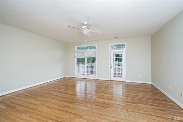 605 Spring St Unit P, Richmond, VA 23220 - unfurnished room featuring a ceiling fan, light wood finished floors, and baseboards