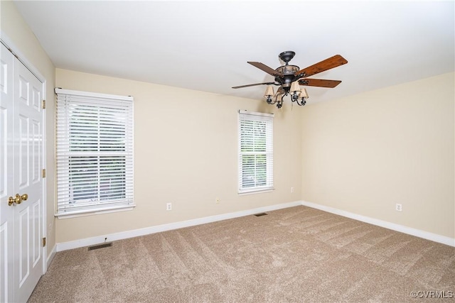 605 Spring St Unit P, Richmond, VA 23220 - unfurnished bedroom with carpet flooring, baseboards, and ceiling fan