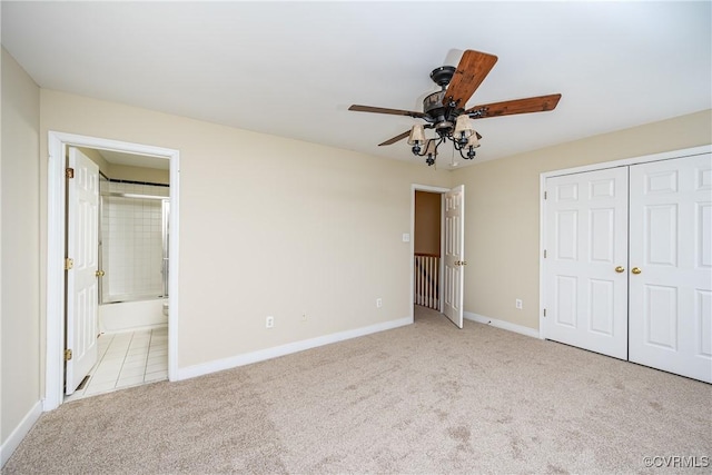 605 Spring St Unit P, Richmond, VA 23220 - unfurnished bedroom with carpet, baseboards, ensuite bath, a closet, and a ceiling fan