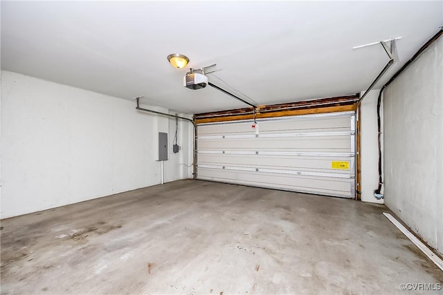 605 Spring St Unit P, Richmond, VA 23220 - garage featuring a garage door opener and electric panel
