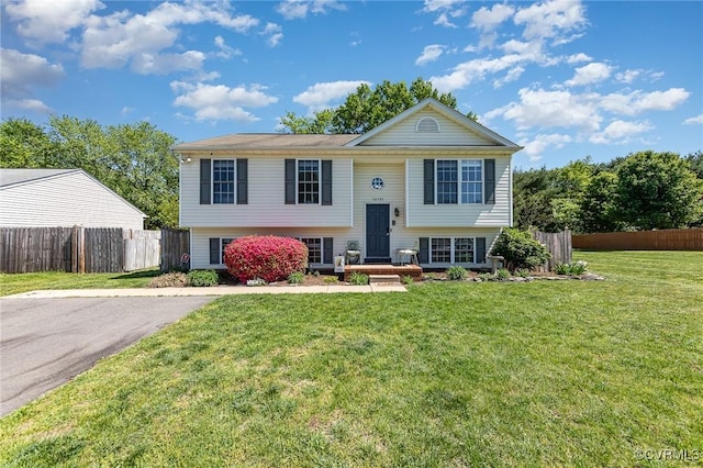 10701 Hamiltons Xing, Fredericksburg, VA 22408 - raised ranch featuring fence and a front yard