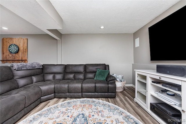 10701 Hamiltons Xing, Fredericksburg, VA 22408 - living room with recessed lighting, a textured ceiling, and wood finished floors