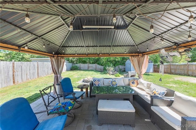 10701 Hamiltons Xing, Fredericksburg, VA 22408 - view of patio / terrace with a gazebo, a fenced backyard, a storage shed, and an outdoor hangout area