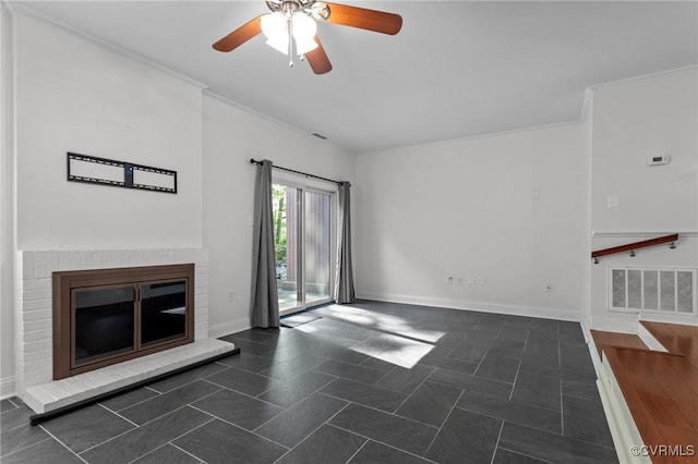 unfurnished living room featuring a fireplace, a ceiling fan, baseboards, visible vents, and ornamental molding