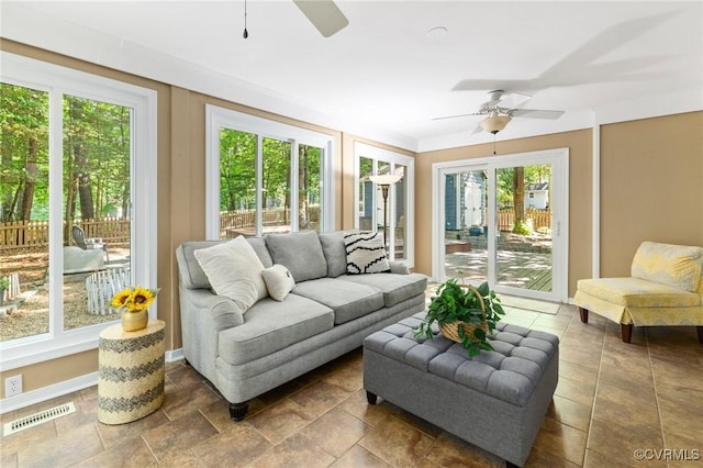 sunroom featuring french doors