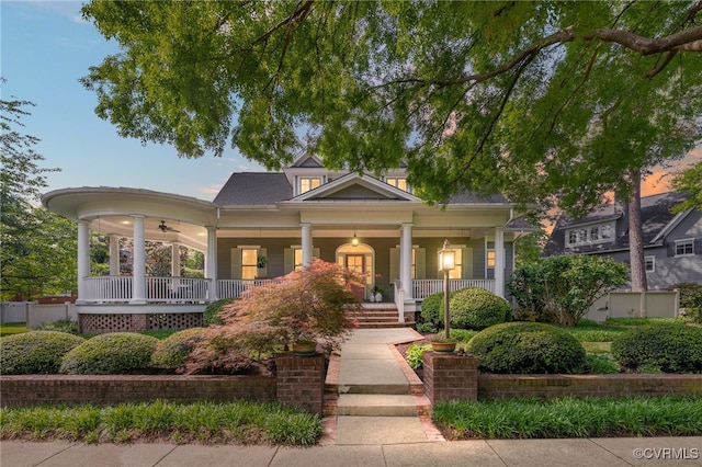 view of front of property with a porch and ceiling fan