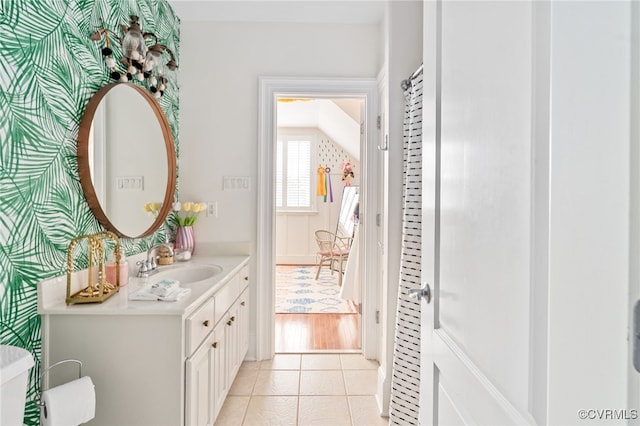 bathroom featuring vanity and tile patterned flooring