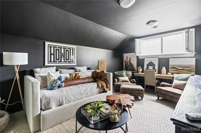 bedroom featuring lofted ceiling