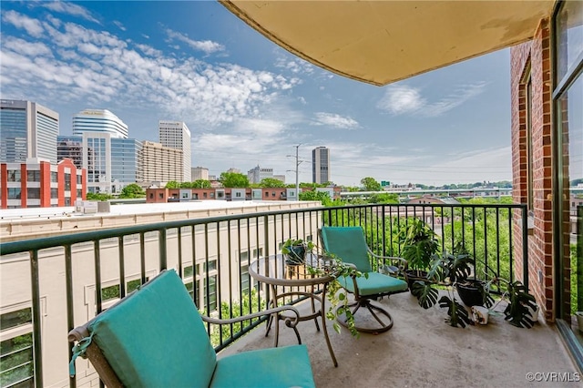 balcony featuring a city view