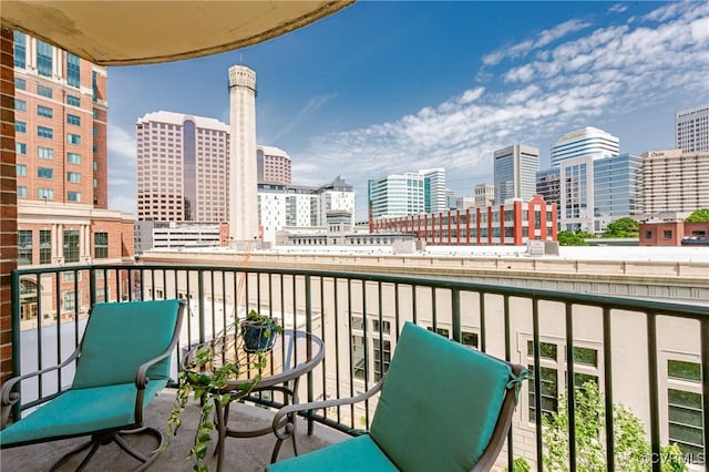balcony featuring a city view