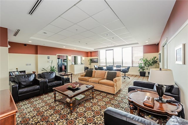 carpeted living room featuring visible vents