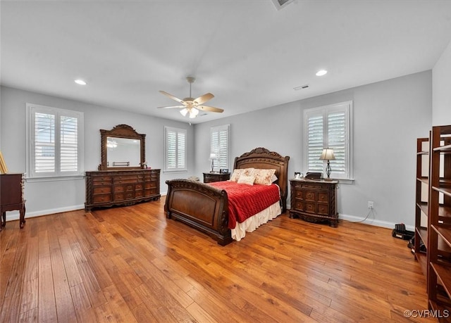 bedroom featuring wood-type flooring, recessed lighting, baseboards, and ceiling fan