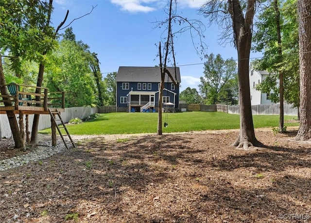 view of yard featuring a fenced backyard