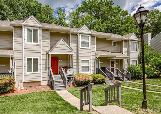 view of property featuring a front yard