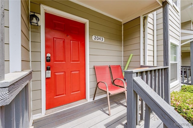 property entrance with covered porch