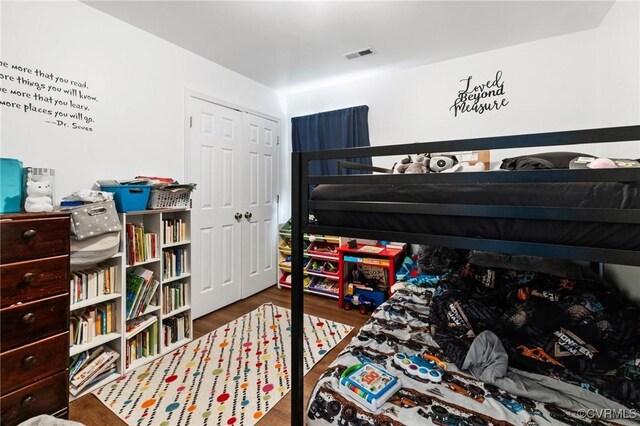 2507 Wright Ave, Richmond, VA 23224 - bedroom with wood finished floors and a closet