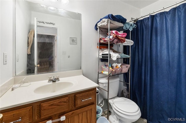 2507 Wright Ave, Richmond, VA 23224 - full bath with toilet, vanity, and a shower with shower curtain