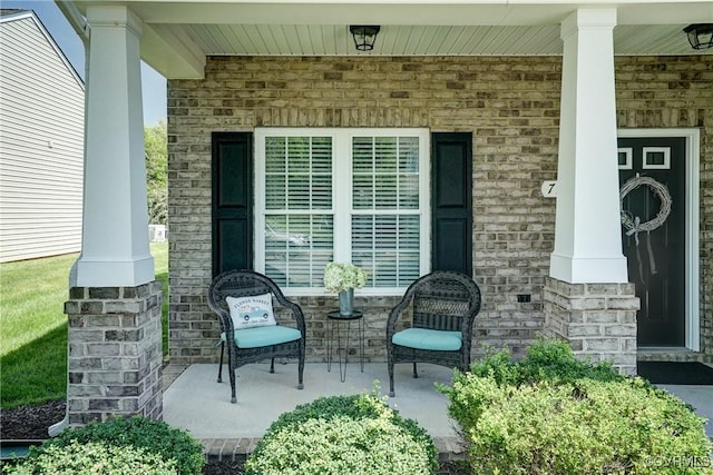 view of patio featuring a porch