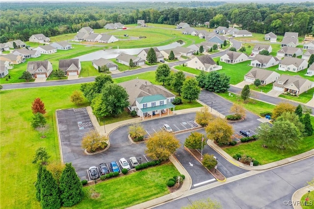 birds eye view of property with a residential view