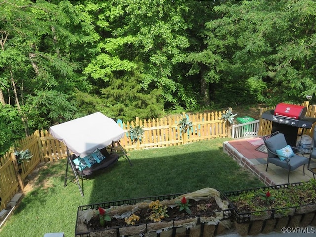 1632 Chestnut Park Ln, Richmond, VA 23222 - view of yard featuring a fenced backyard and a vegetable garden