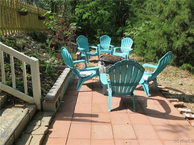 1632 Chestnut Park Ln, Richmond, VA 23222 - view of patio with an outdoor fire pit and fence