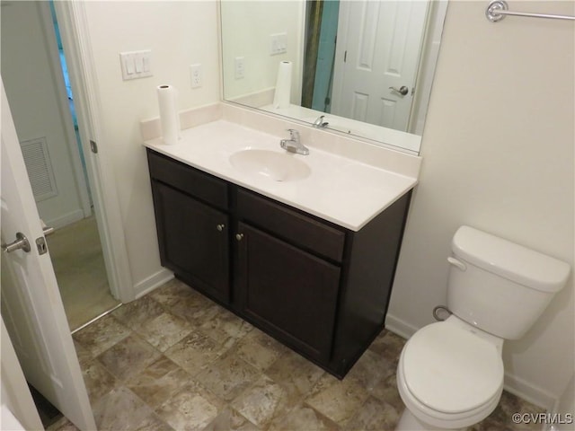 1632 Chestnut Park Ln, Richmond, VA 23222 - bathroom featuring visible vents, baseboards, toilet, and vanity