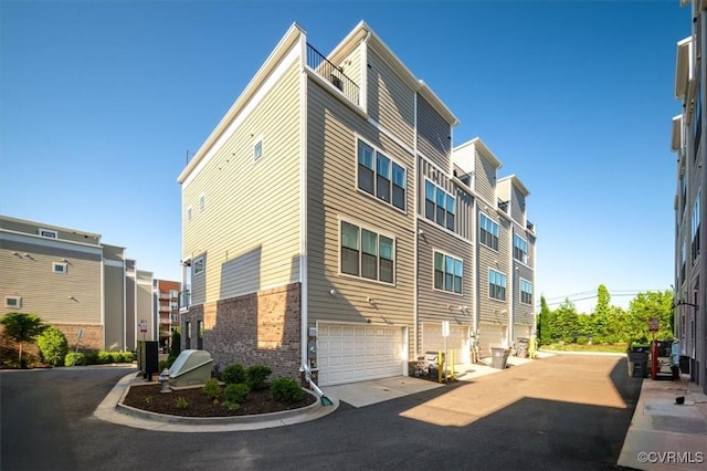 view of building exterior featuring an attached garage