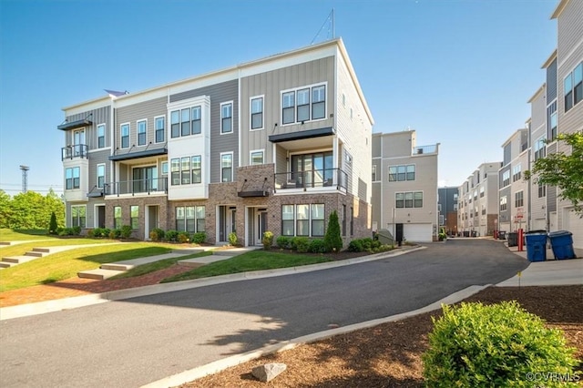 view of building exterior with a residential view