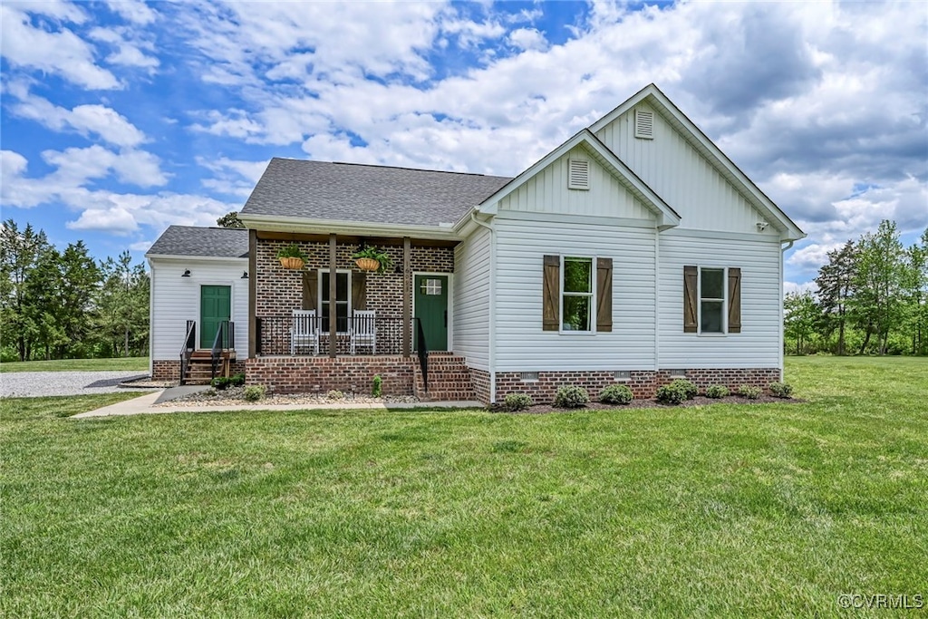 16093 Union Church Rd, Beaverdam, VA 23015 - view of front of home with a porch, a front yard, board and batten siding, roof with shingles, and crawl space