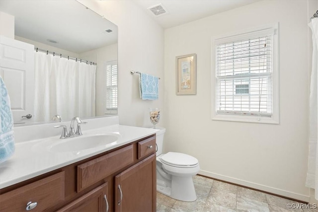 7315 Cornus Ave, Chesterfield, VA 23832 - full bath with vanity, toilet, baseboards, and visible vents
