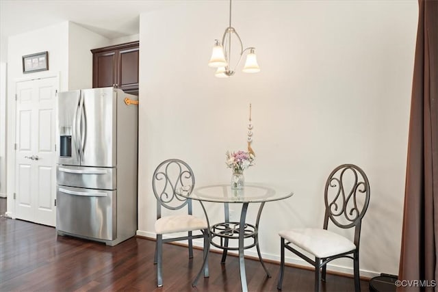 7315 Cornus Ave, Chesterfield, VA 23832 - dining space with an inviting chandelier, baseboards, and dark wood finished floors
