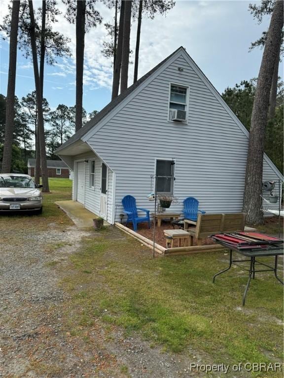 79 Blue Crab Dr, Moon, VA 23109 - rear view of house featuring a yard and cooling unit