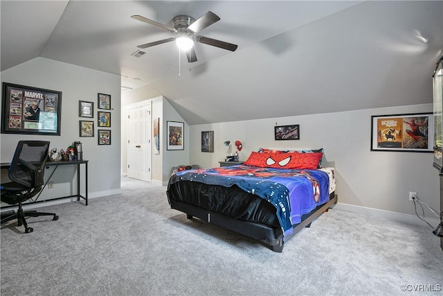 bedroom featuring a ceiling fan, carpet floors, visible vents, baseboards, and lofted ceiling