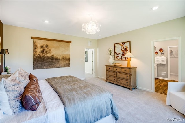 carpeted bedroom with baseboards, recessed lighting, an inviting chandelier, and visible vents