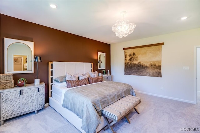 carpeted bedroom with baseboards and a notable chandelier