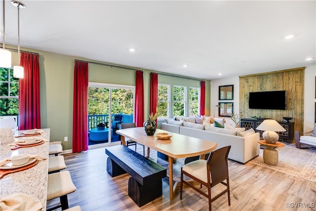 dining space featuring recessed lighting and light wood-style floors